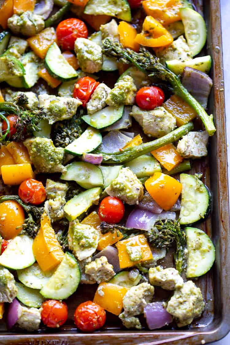 This sheet pan Pesto Chicken and Veggies is flavorful, healthy, and so easy to make!