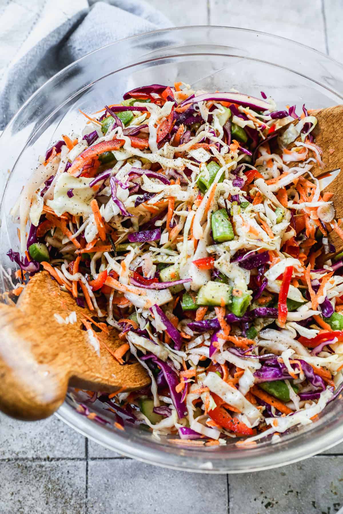 This Vinegar Coleslaw recipe is a tangy make-ahead side that travels well and pairs with ham.