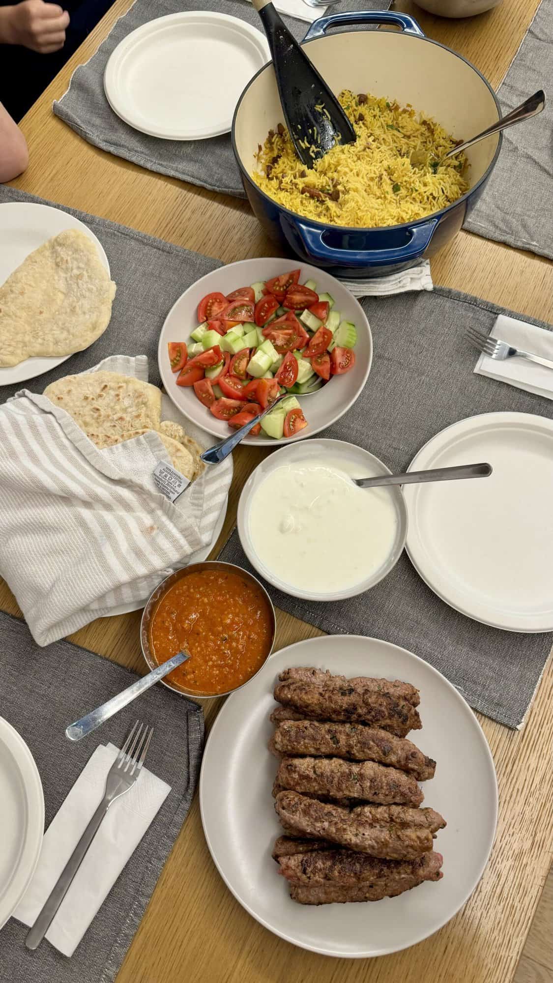 A fun, family-style yogurtlu kebabs dinner that’s perfect for sharing with warm pita and all the sauces.