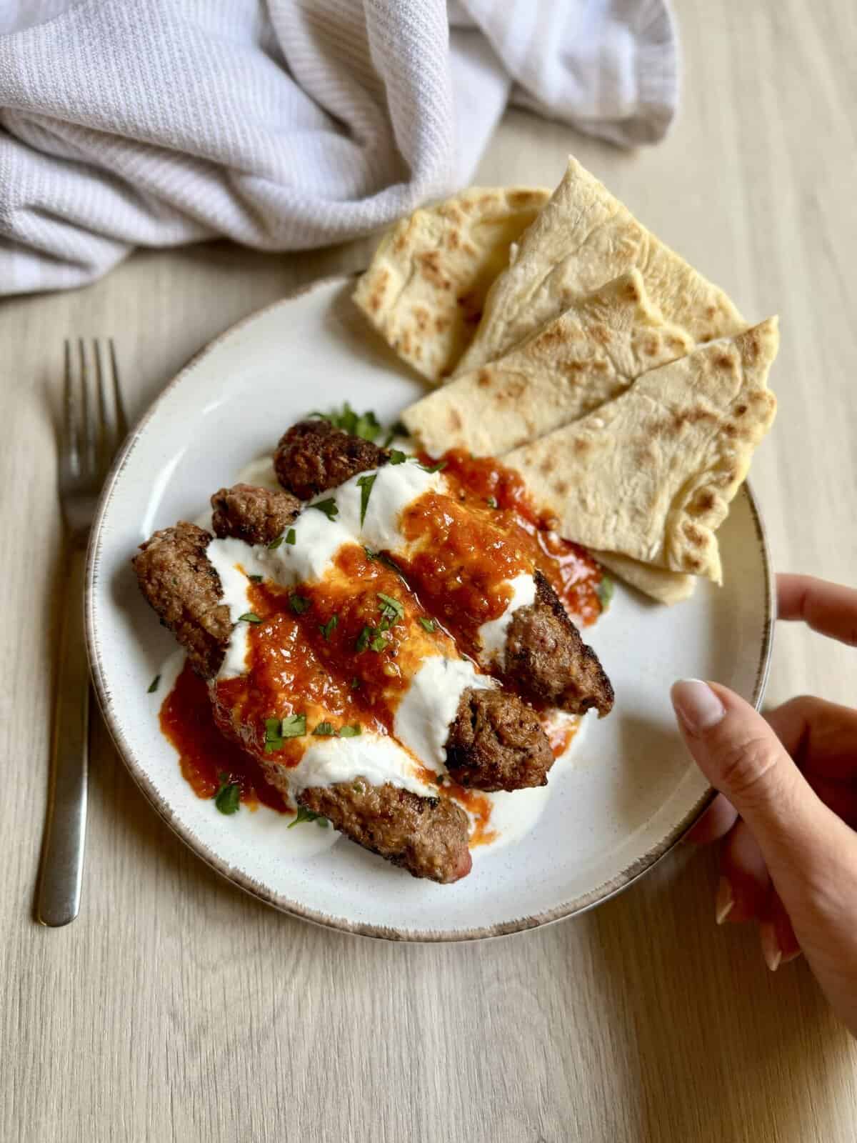 Yogurtlu kebabs (ground beef kebabs) are my go-to “impress without stress” dinner - easy enough for home, fancy enough for guests.