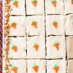 This Carrot Cake Sheet Cake recipe is tender, moist, and perfectly spiced. It's topped with a light and fluffy whipped cream cheese frosting and big enough for a crowd.
