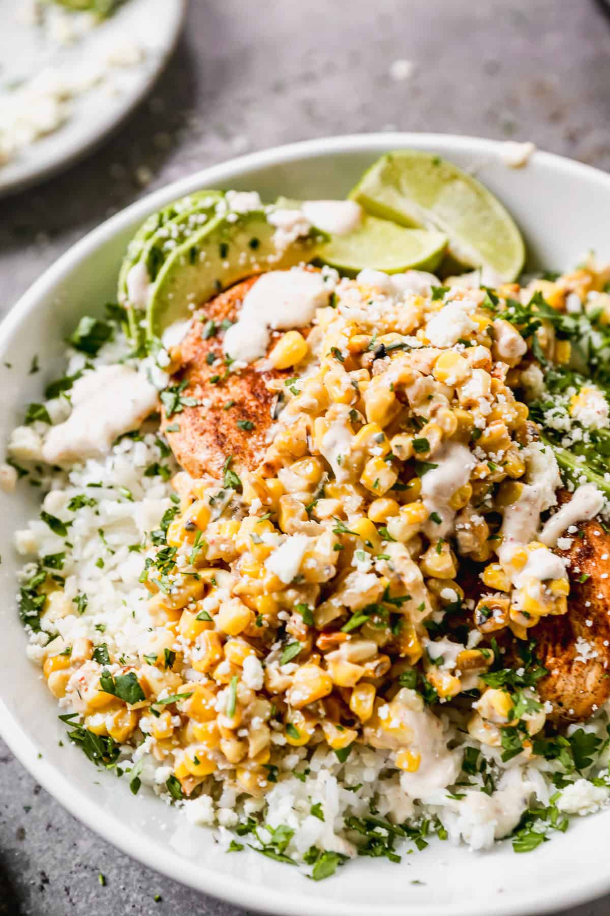Street Corn Chicken and Rice Bowls are an easy weeknight bowl meal that feels fun, fresh, and satisfying.