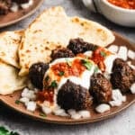 These Yogurtlu Kebabs turn ground beef into something special with creamy yogurt sauce and warm spiced tomato sauce.