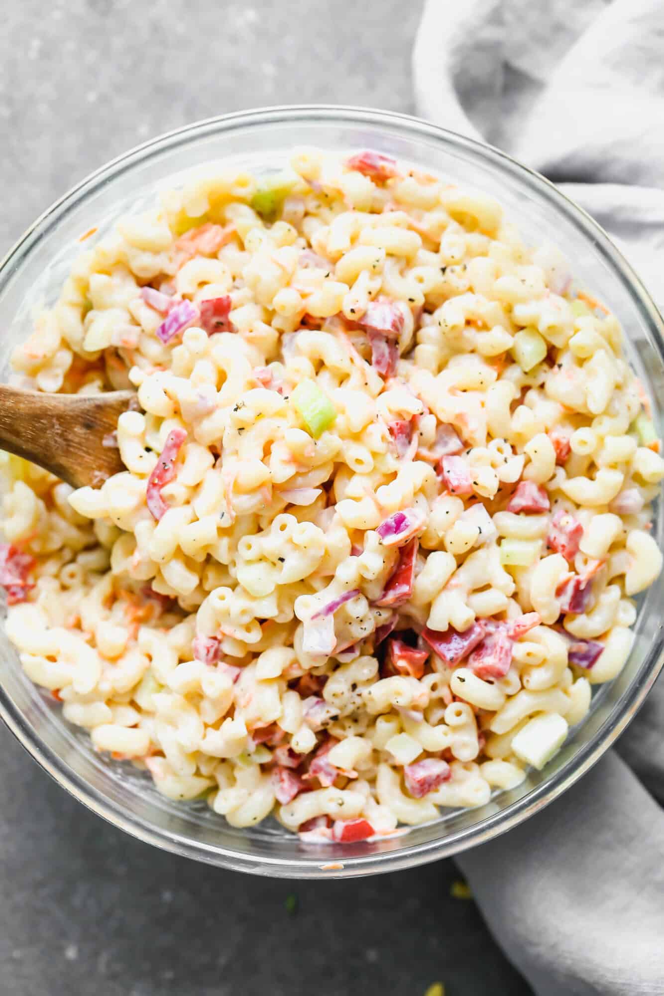 Macaroni Salad is the classic cookout recipe that knows exactly where it belongs at every BBQ, picnic, and family gathering.
