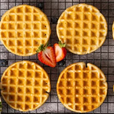 These homemade Freezer Waffles are so easy to make in just a few minutes and can be frozen for months! Simply pull one out of the freezer and toss it in the toaster, air fryer, or oven and breakfast is ready!
