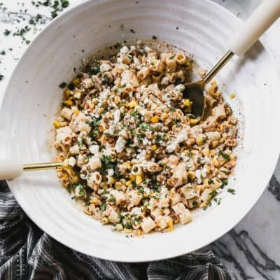 This mexican street corn pasta salad is creamy, zesty, and the easiest way to bring elote flavors to your next cookout.