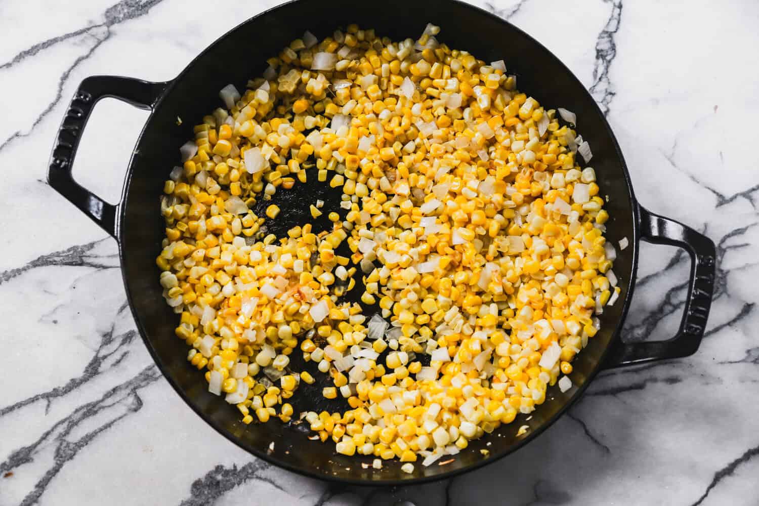 Toasty corn adds that smoky-sweet street corn flavor that makes this pasta salad impossible to stop eating.