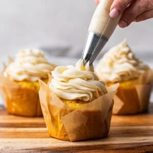 This easy Vanilla Buttercream Frosting recipe is light, fluffy, and so creamy! It is great on cupcakes, sugar cookies, or layered cakes!
