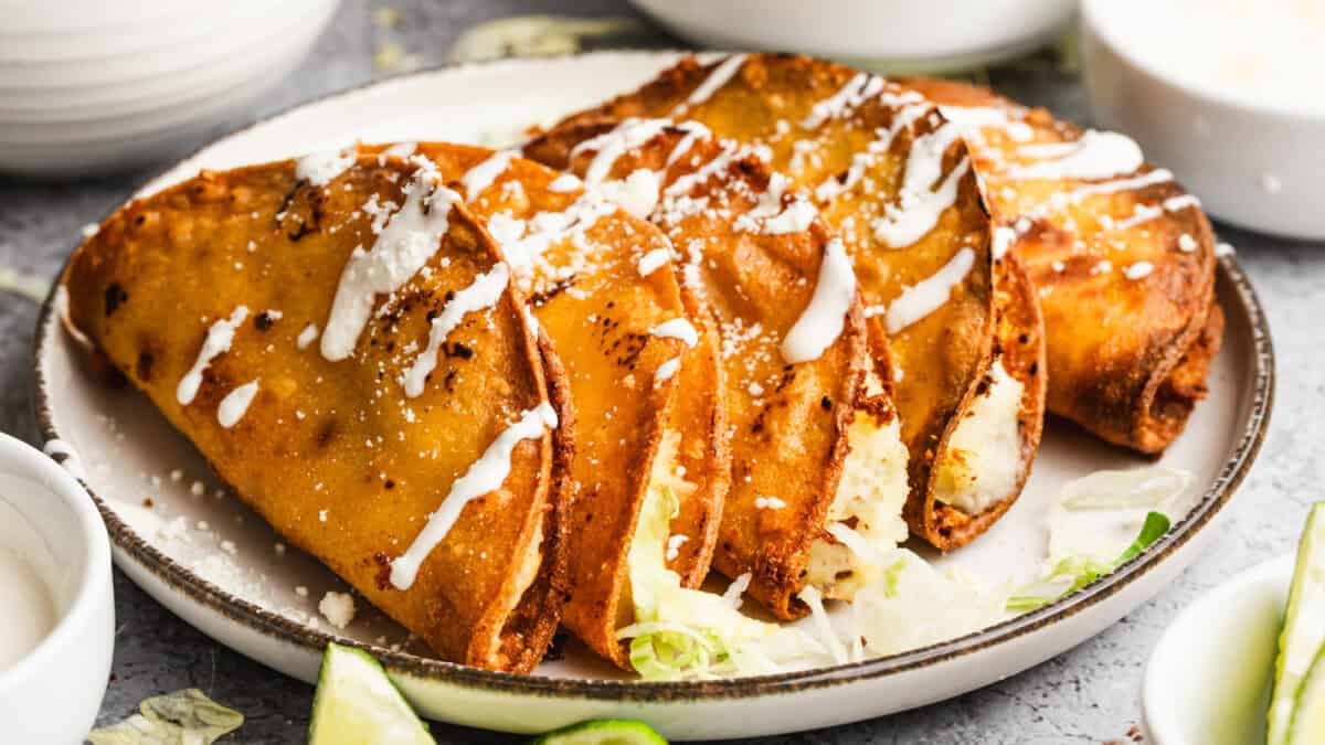 These Crispy Potato Tacos (Tacos de Papa) have cheesy mashed potatoes inside a crispy corn tortilla shell. It is the epitome of comfort food!