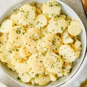 This easy German Potato Salad recipe is full of fresh ingredients and a light sauce. It's such a yummy potato salad!