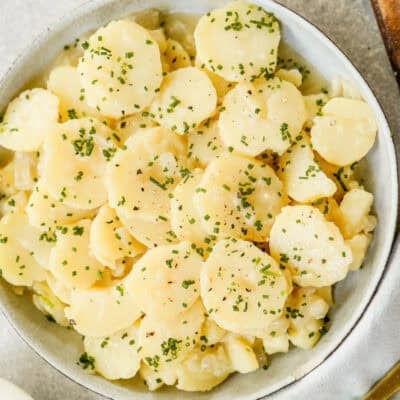 This easy German Potato Salad recipe is full of fresh ingredients and a light sauce. It's such a yummy potato salad!