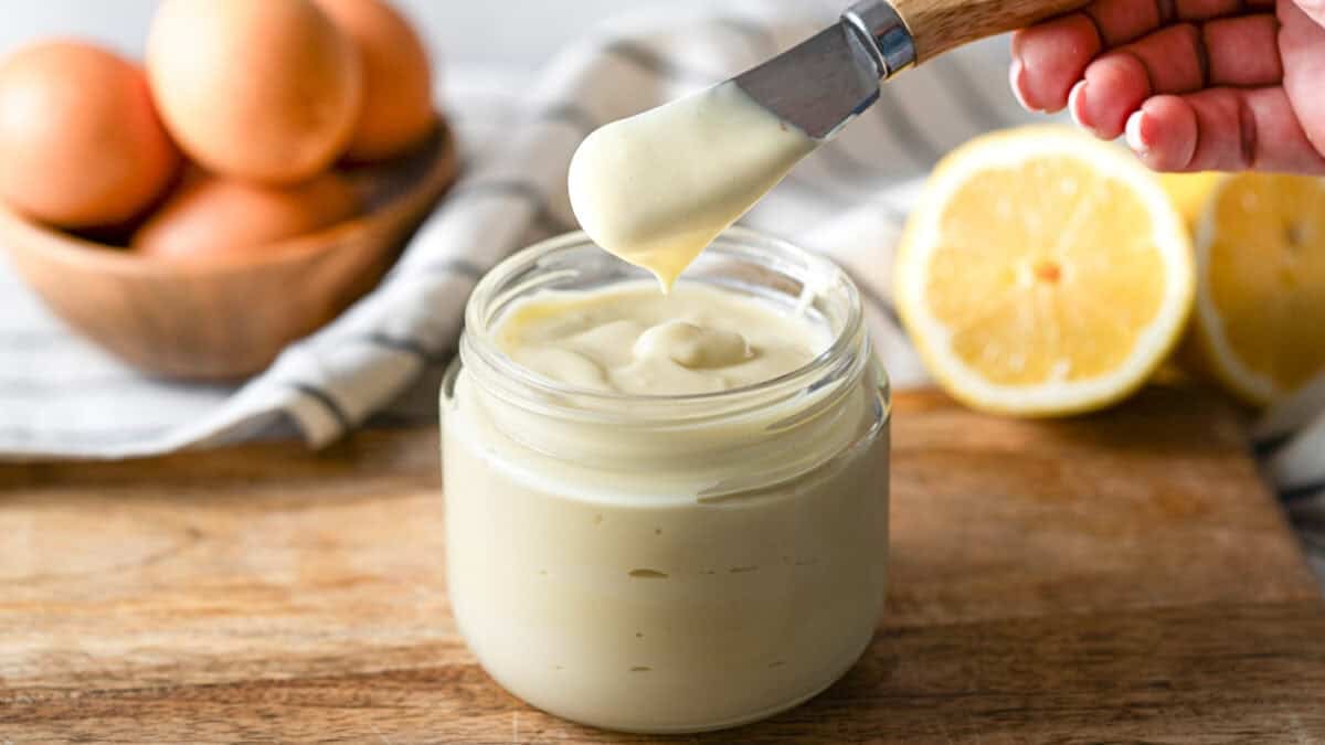 This homemade Mayo recipe only uses a few ingredients and is made in just 5 minutes with an immersion blender! It is creamy, simple, and makes every sandwich better.