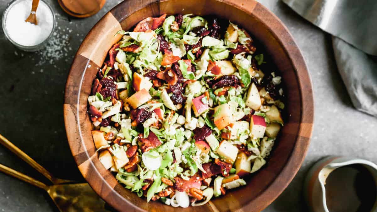 This Brussels Sprout Salad uses shredded brussels sprouts as the base then topped with apples, craisins, pecans, and a homemade vinaigrette.