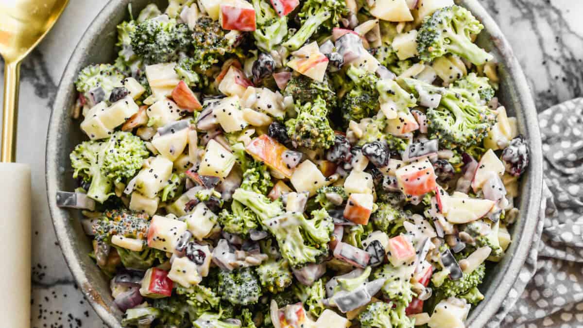 This broccoli salad is loaded with broccoli, apples, craisins, and coated in a creamy poppyseed vinaigrette.