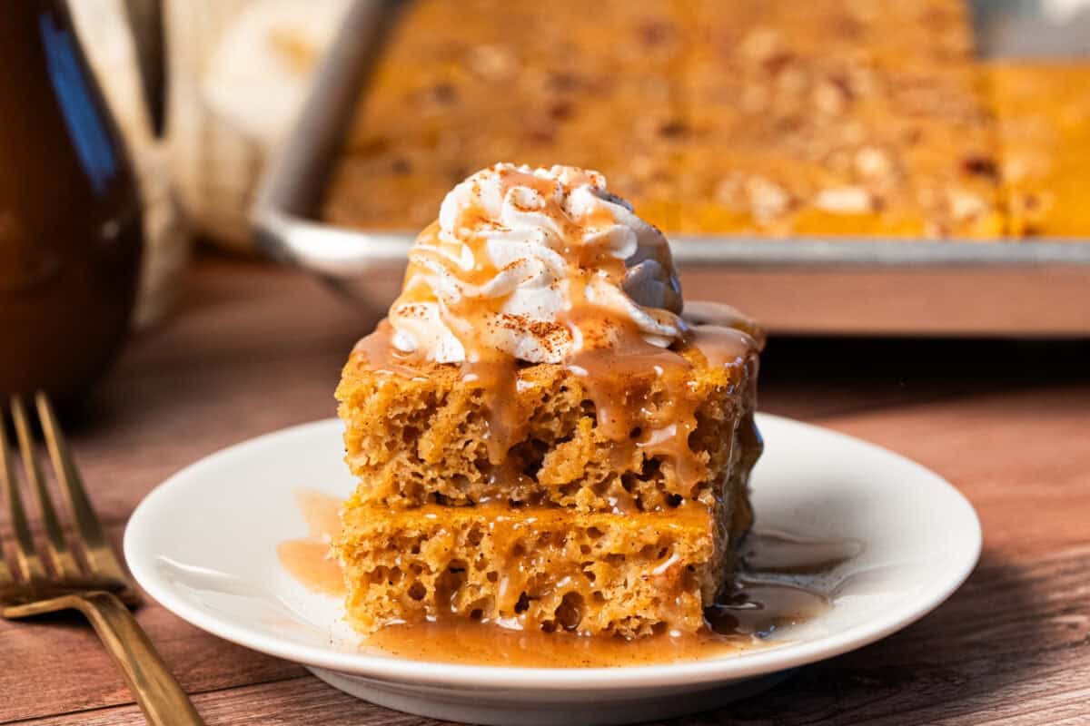 This easy Pumpkin Sheet Pan Pancakes recipe is made in 20 minutes and feeds a crowd. It's the perfect Fall breakfast!