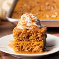 This easy Pumpkin Sheet Pan Pancakes recipe is made in 20 minutes and feeds a crowd. It's the perfect Fall breakfast!