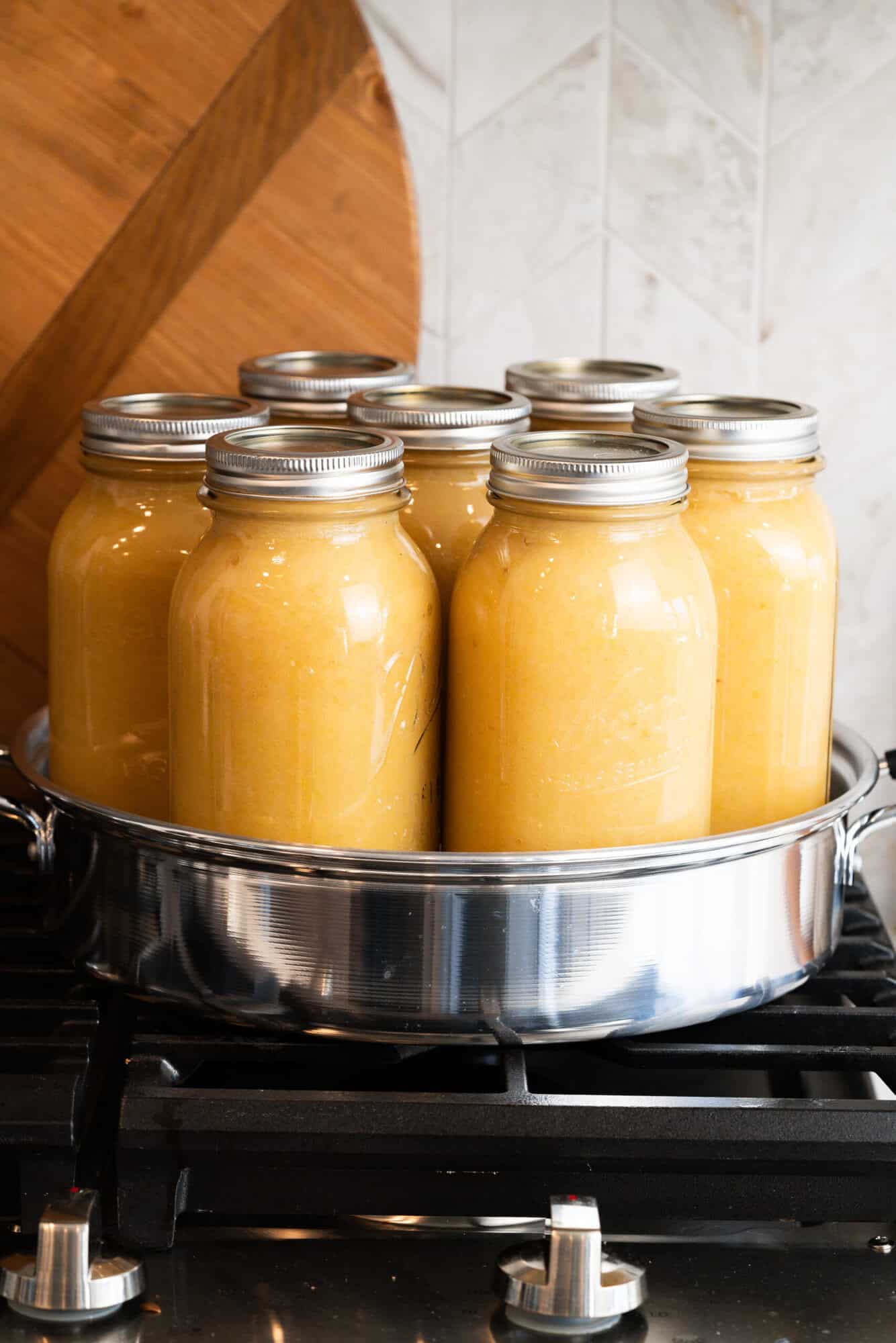 Learn how to can applesauce in no time with just apples and water!