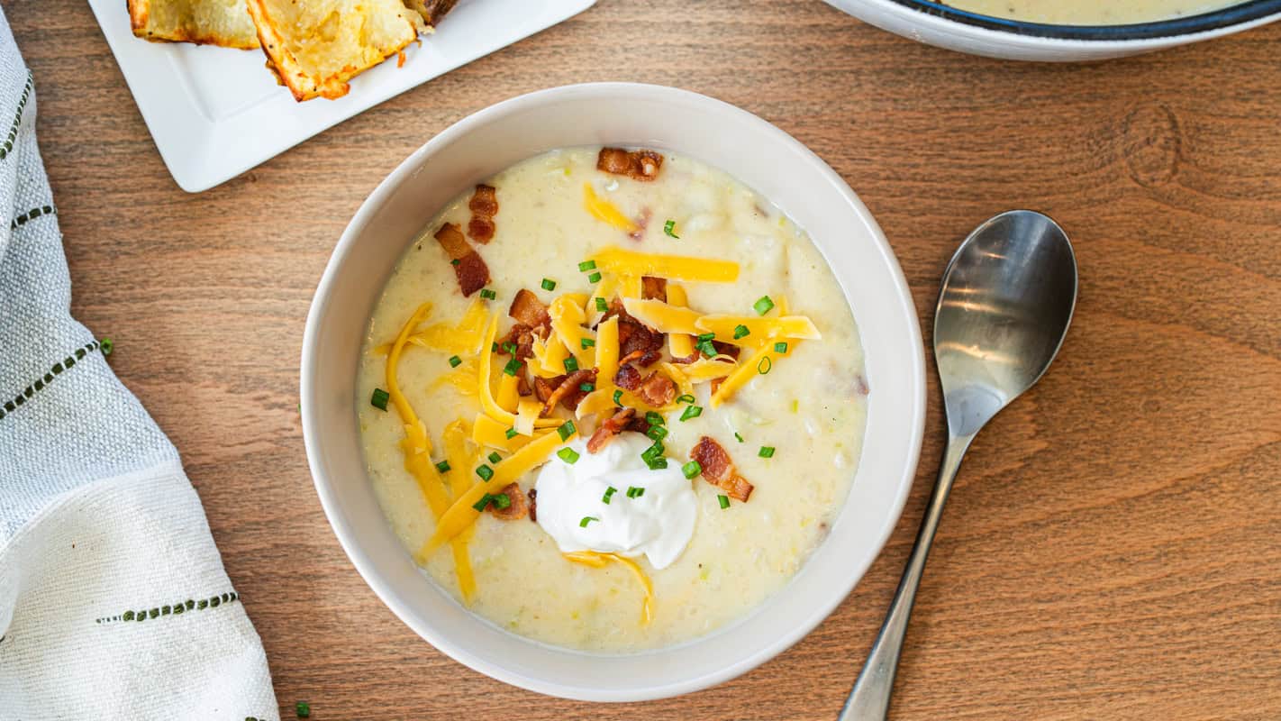 Baked Potato Soup tastes a lot better when you bake the potatoes instead of boiling them, and you're left with crispy potato dippers!