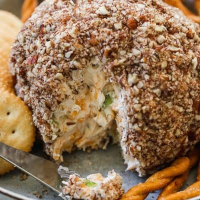 A holiday cheese ball is the perfect way to dress up the table this holiday season. It's easy and can be made ahead too!