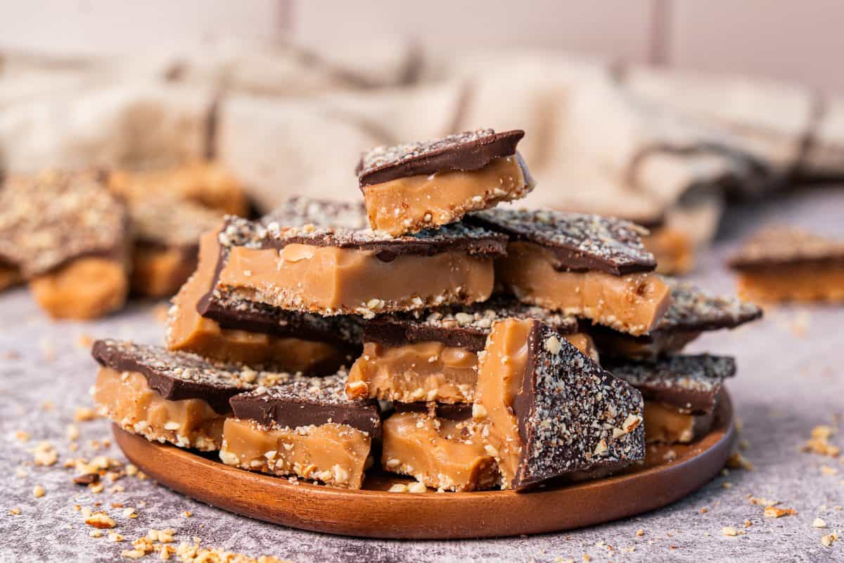 Homemade Toffee is easier than you think and once you make it you will be addicted! It's buttery, chocolatey, and has that perfect snap!